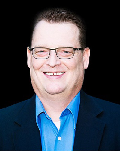 Headshot of Dominic Schuessler