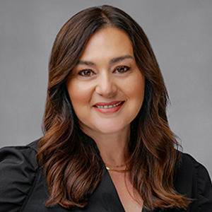 Headshot of Jennifer Meadors, smiling professionally.