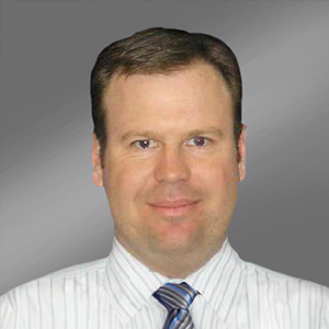Headshot of Terry Ward, smiling professionally.