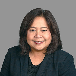 Headshot of Mary Mercado Garcia, smiling professionally.