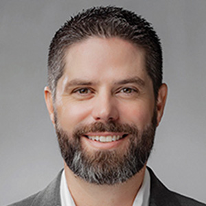 Headshot of Scott Black, smiling professionally.